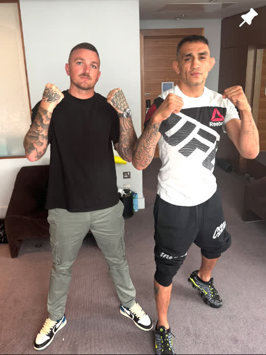 Sean with a UFC athlete in a photo from his Instagram